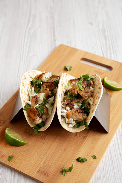 istock Homemade Fresh Fish Tacos, low angle view. Copy space. 2219930238