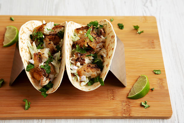 istock Homemade Fresh Fish Tacos, low angle view. Close-up. 2219930342