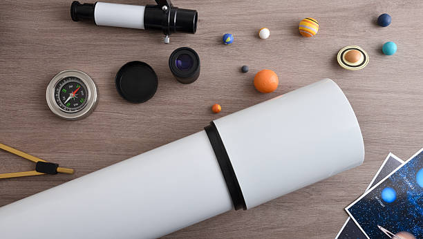 istock Concept of studying planets with telescope material and planets 2219930852
