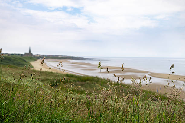 The Wooden Cross on Church Hill at Alnmouth marks the spot where the village church stood until a storm diverted the River Aln cutting it off