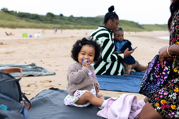 istock Happy Baby Sitting on a Blanket 2219949145