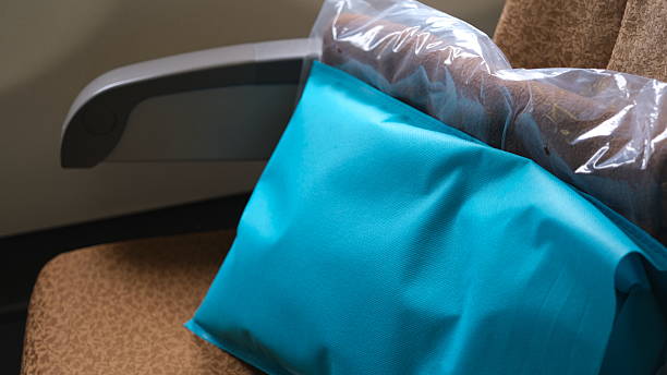The pillows and blankets provided for free on the airplane.