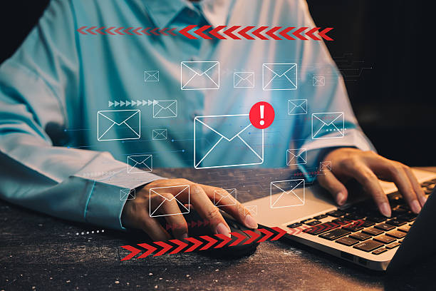 istock Email concept. Focus on Hands Typing on Laptop with Email Notification Icons and Alerts in a Modern Workspace Environment 2219954227
