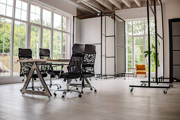 istock Modern industrial office setting with workspace for collaborative meetings and business activities 2219954672