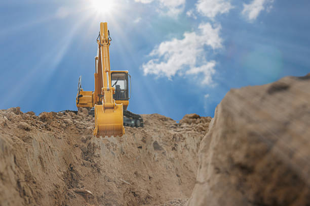 istock Excavator with Bucket  are digging  soil in the construction site. 2219957111