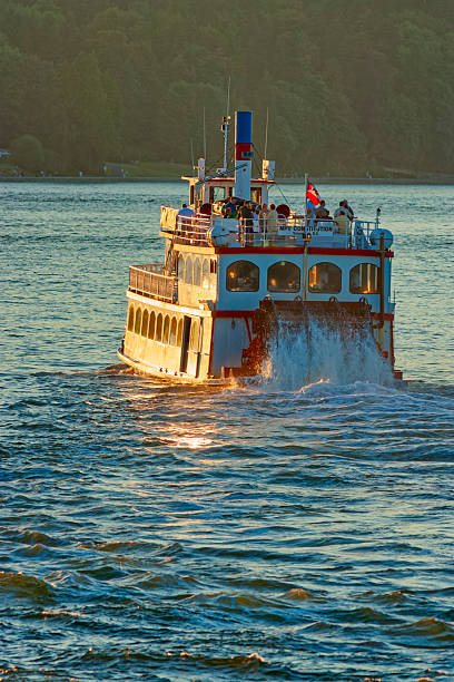 The city of Vancouver region in the province of British Columbia on August 20, 2005:  Sunset view of a classic paddle wheel harbor tour boat in Vancouver's Burred Inlet Harbor, British Columbia