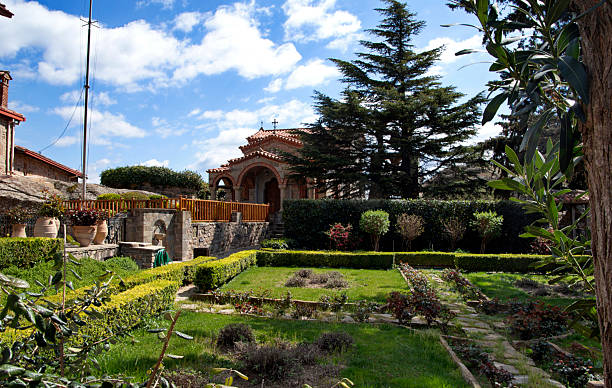 istock view of the monastery garden against the sky with clouds 2219964111