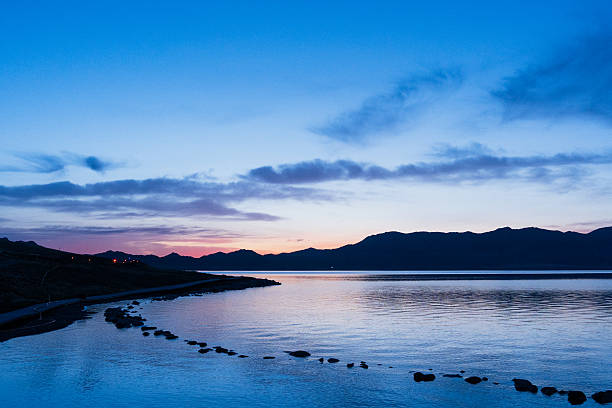 istock sunset over the Sayram lake 2219965949