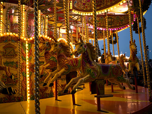 London, UK - April 29th 2025: A Galloper Carousel, or Merry-go-Round at a Fun Fair.