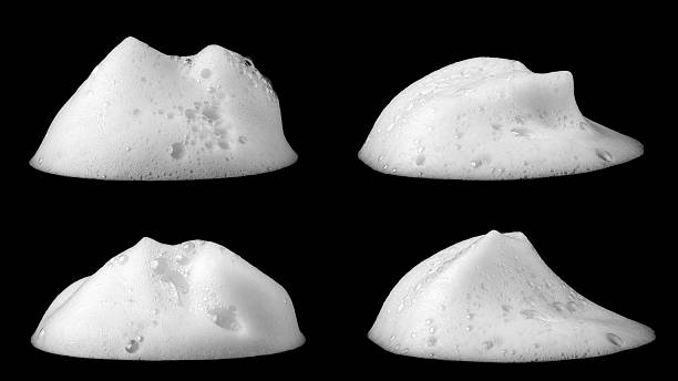 istock Liquid white foam from soap or shampoo or bath bubbles. Abstract soap bubbles. Soap bubbles set. Soap bubbles isolated on black with texture and contrast background. 2219969392