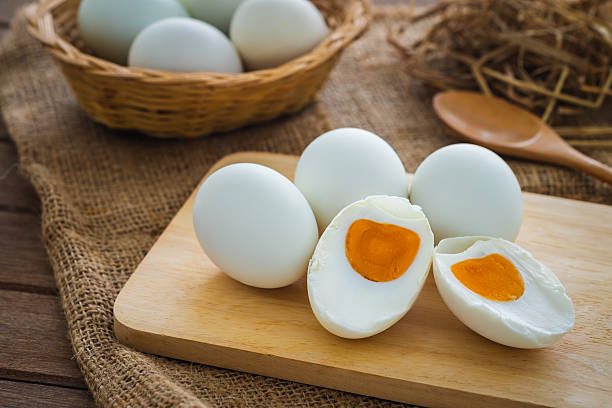 istock Salted duck eggs on wooden board 2219970931