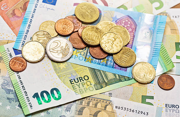 istock European currency: euro banknotes and coins 2219974008