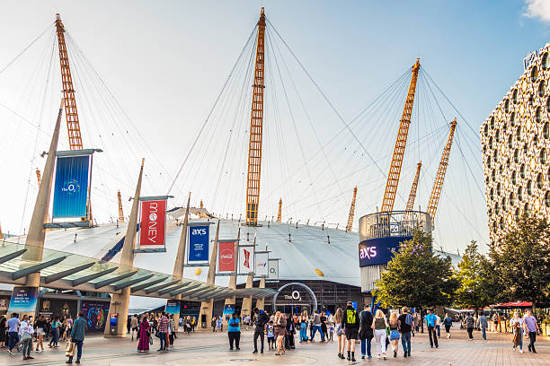 London, UK - People outside the main entrance to the O2 Arena in Greenwich, London.