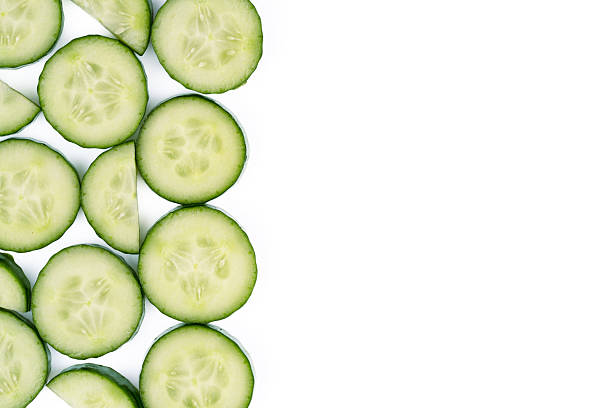 istock Fresh and tasty cucumber isolated on white background 2219975068