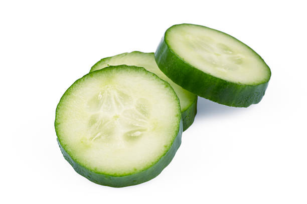istock Fresh and tasty cucumber isolated on white background 2219975117