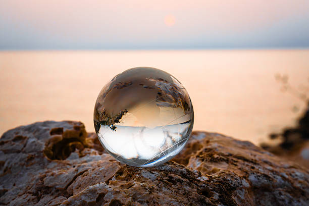 istock Crystal Ball Sunset Reflection. Inverted Cityscape at Golden Hour 2219975846