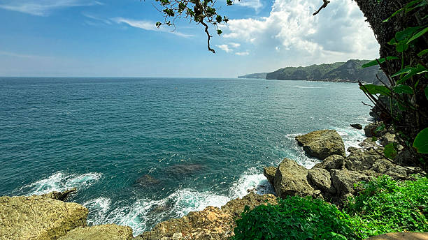 istock Rocky Coastal View with Cliffs and Ocean Horizon 2219977441