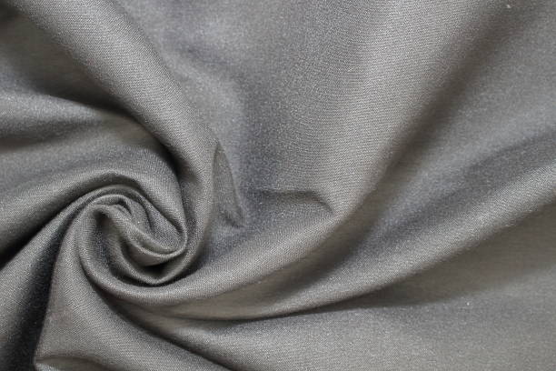 istock Delicate sheen and shadows of Grey Fabric. 2219977726