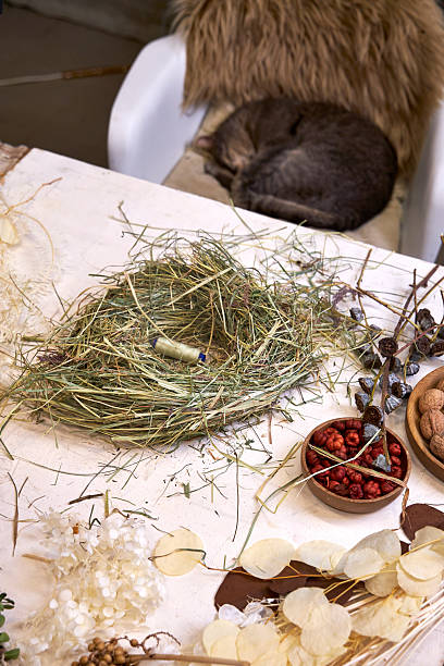 istock Top View of Floral Wreath Making Materials and Wire Base on Rustic Table 2219985407