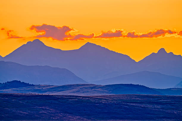 The sun rises over the landscape at Rocky Mountain National Park in Colorado