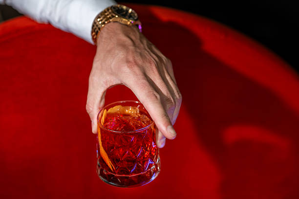 istock Man Holding Negroni Cocktail 2219996473