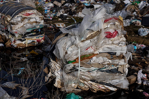 istock Plastic waste and garbage remain piled at a landfill site, highlighting the severe pollution and challenges in waste management 2219998518