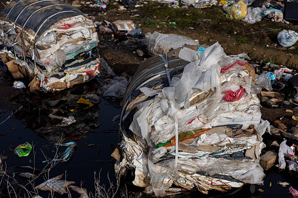 istock Large piles of plastic and mixed waste accumulate at a landfill, emphasizing the urgent need for better waste management practices 2219998519