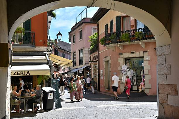 A view through an archway in part pf the old town of Peschiera, Veneto, Italy. The town is encircled by huge Venetian defensive systems that have been a UNESCO World Heritage Site since July 2017.