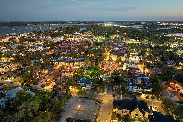 istock St. Augustine, Florida. American architecture with illuminated city streets and historical buildings at night. USA travel destination 2220002327