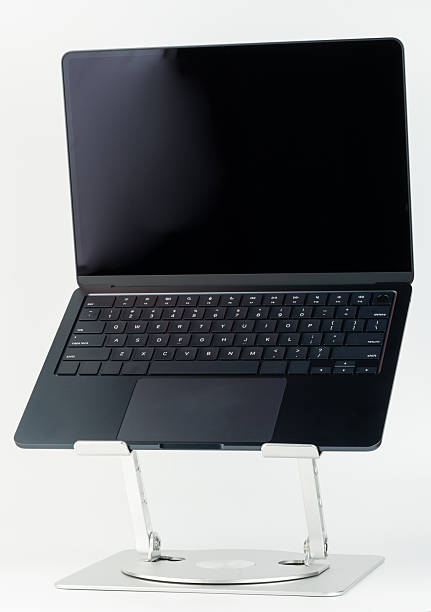 istock Sleek laptop on modern stand against clean, elegant background 2220007067