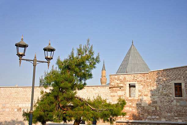 Konya Alâeddin Mosque. Konya Alâeddin Mosque was built in the 13th century during the Anatolian Seljuk period. City center of the Konya during sunset over medieval type buildings.