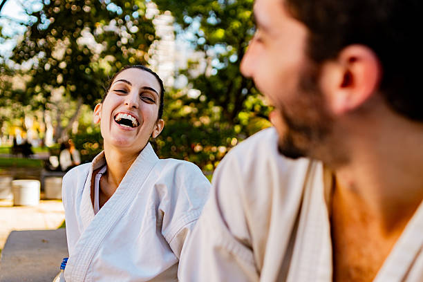 istock Karate athletes talking on the public park 2220008808