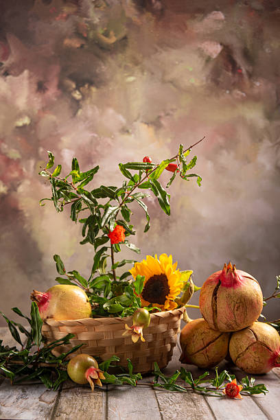 istock Pomegranates, arrangement with beautiful pomegranates on rustic wood with abstract background, selective focus. 2220012391