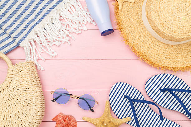 istock Blue beach accessories on wooden background, top view. Copy space for text 2220012414