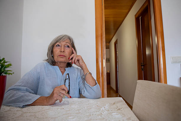 istock Elderly woman at home 2220016074