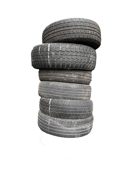 istock Stack of old used car tires is isolated. 2220016544