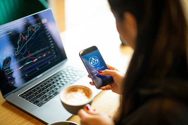 istock Asian woman using ai assist for analyzing crypto trading graph. 2220025422