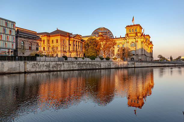 istock Reichstag with reflection in Spree, Berlin 2220026299