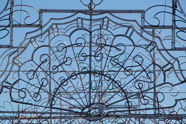 istock Ornamental iron gate against clear blue sky 2220029214