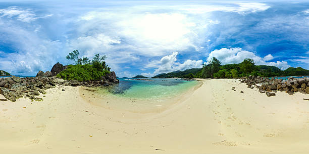 istock Rocky shore meeting calm waters. Mahe, Seychelles. 2220031296