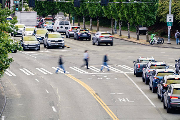 istock Pedestrians Crossing Busy Street 2220042380