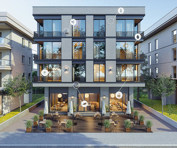 istock Building Exterior With Smart Home Icons. Remote Control With Mobile App And Technology Devices 2220049056
