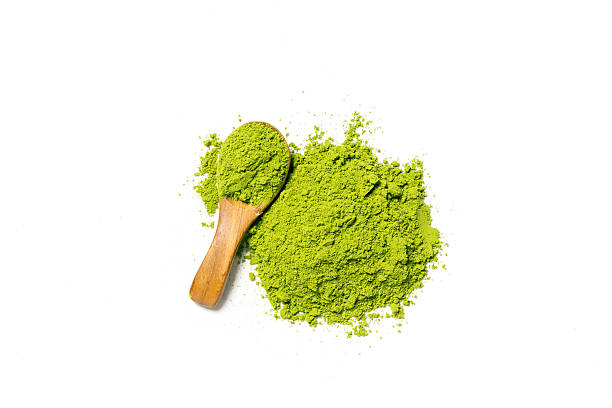 istock Top view green matcha tea powder isolated on white background 2220049975