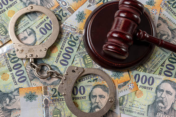 istock Gavel, handcuffs and hungarian forints 2220057657