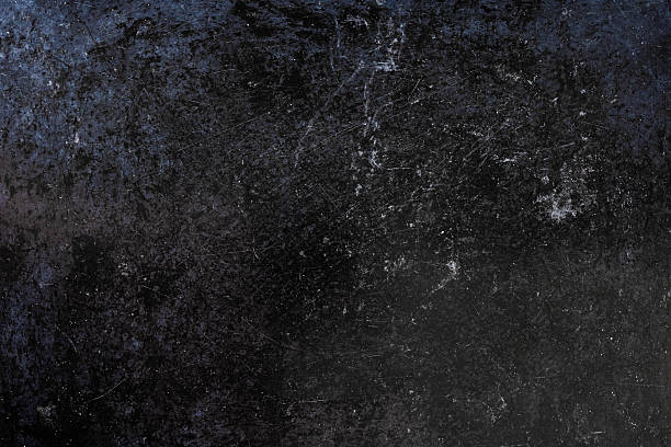 istock black enameled metal with stains and scratches 2220067623