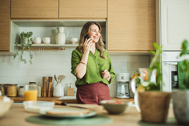istock Woman doing a first morning tasks in the kitchen 2220068176
