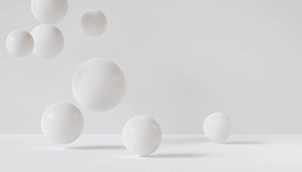 istock Falling white 3d rendering spheres on white room. Abstract geometric minimal background. 2220071116