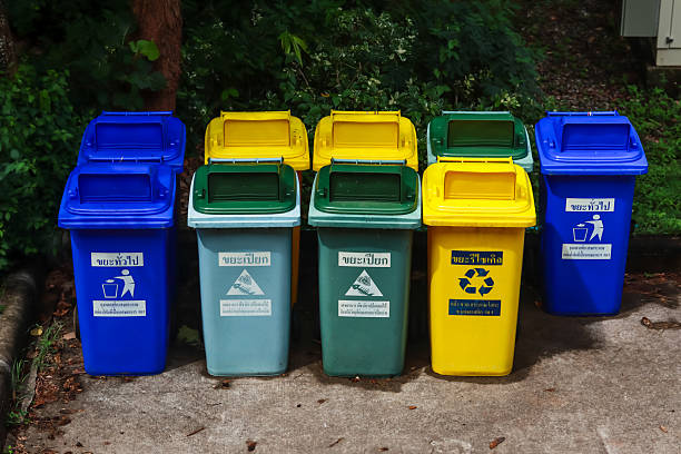 istock Rows of colorful recycling bins. 2220072519
