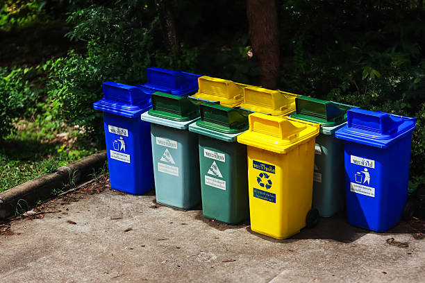 istock Rows of colorful recycling bins. 2220072526