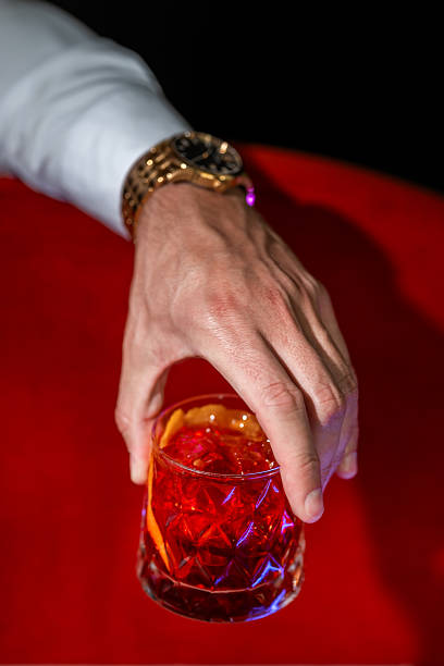 istock Man Holding Negroni Cocktail 2220075391